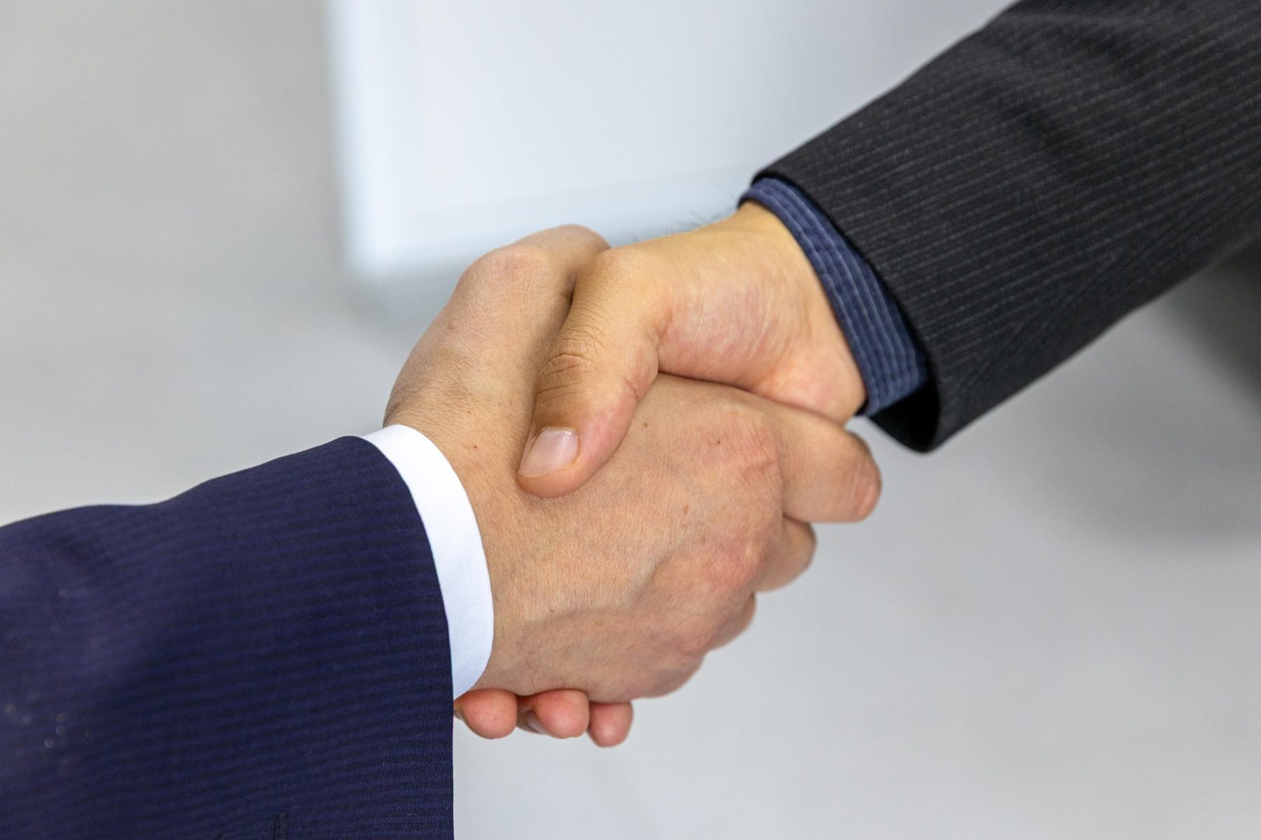 A handshake between a solicitor and a client