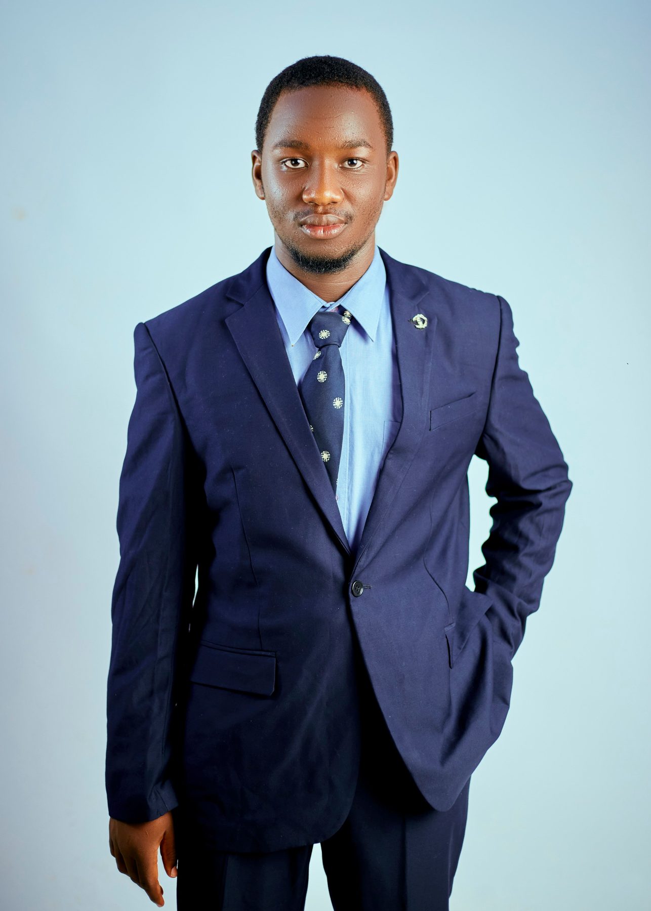 Solicitor, in a navy suit